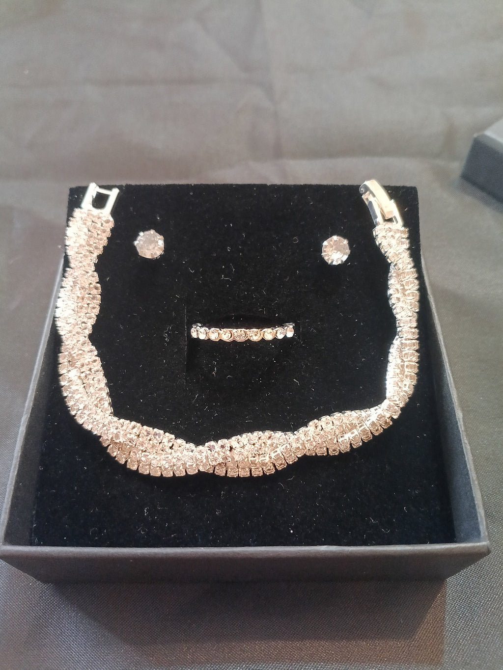 Set Bracciale Tennis Intrecciato Argento con Orecchini e Anello