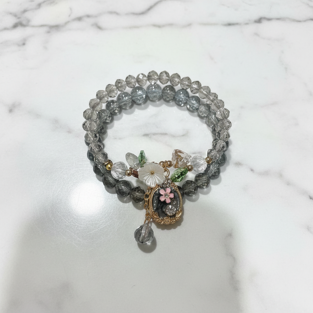 Bracciale Cristalli Grigio con Charm Fiore