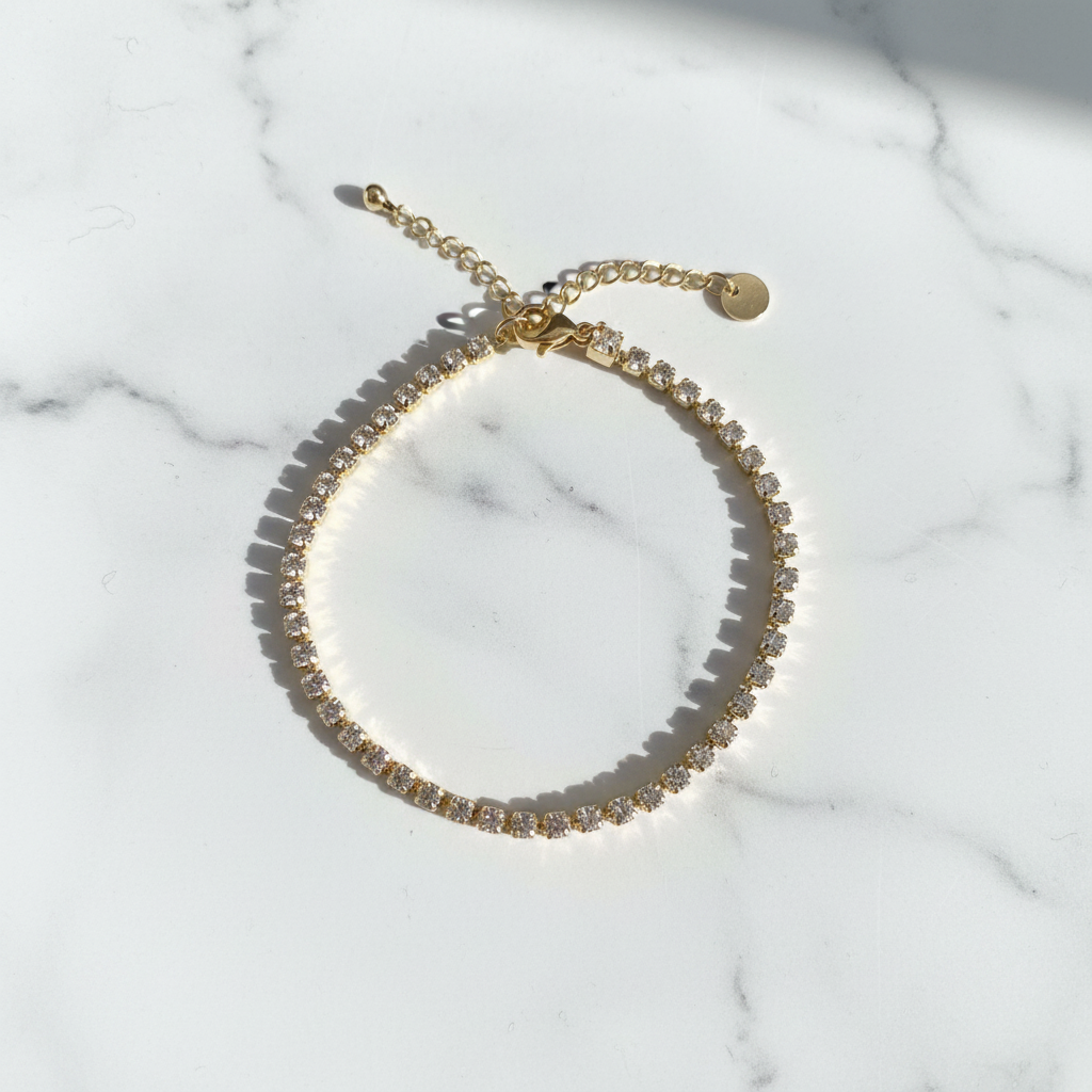 Bracciale Tennis Dorato flat lay