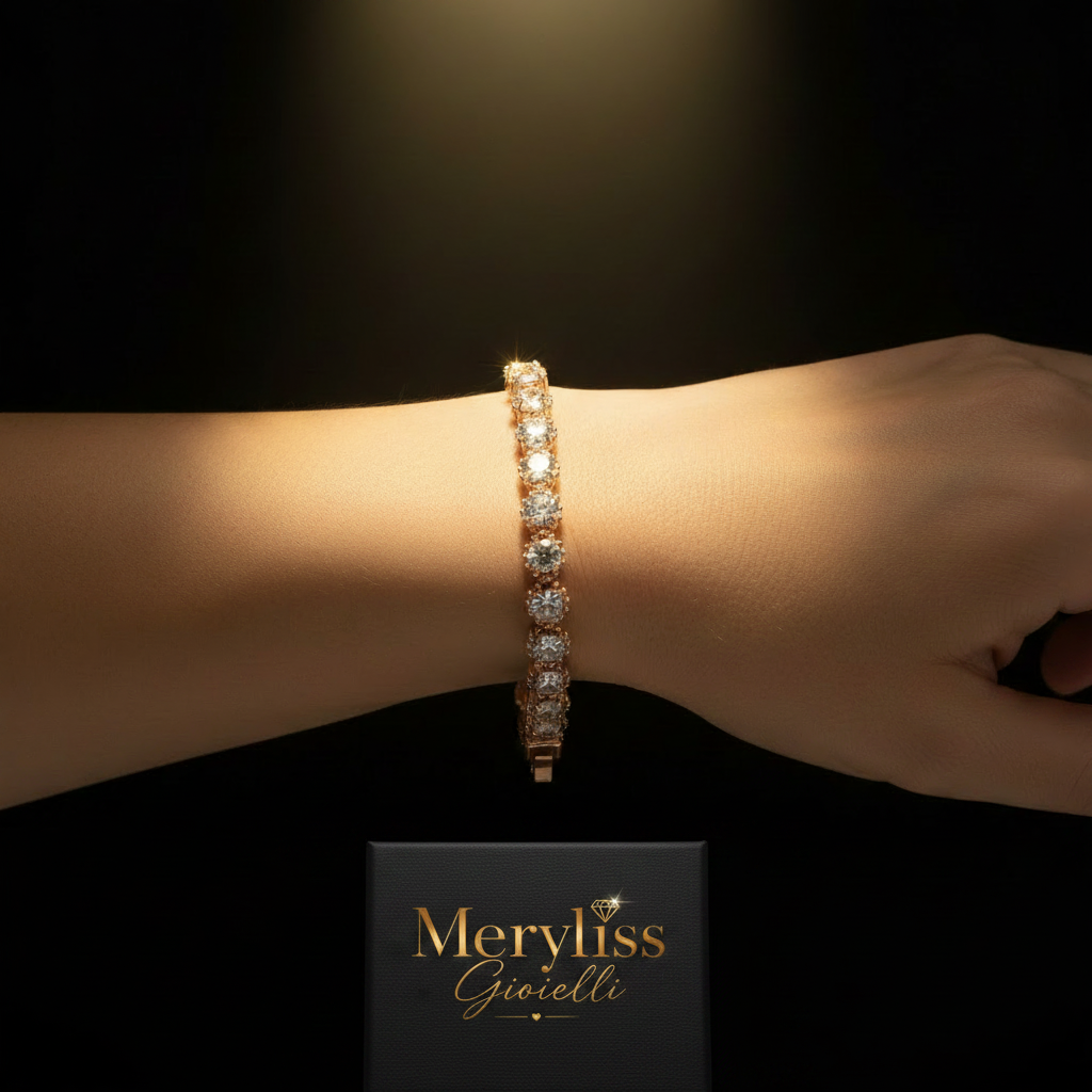 Bracciale tennis oro rosé zirconi indossato al polso con scatolina Meryliss Gioielli