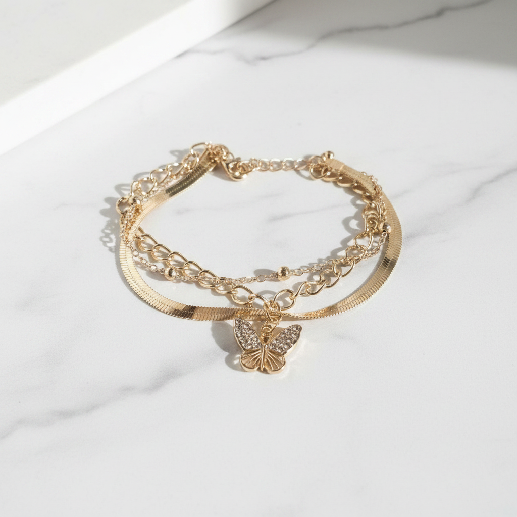 Bracciale Farfalla Oro flat lay